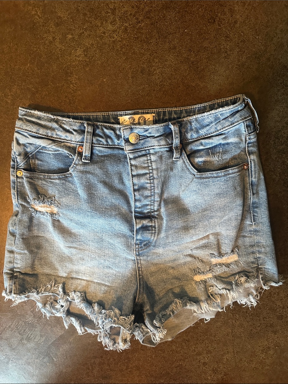 We The Free Washed Light Blue Distressed Denim Cutoff Shorts